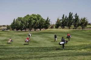 Golfers walking on the course